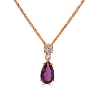 Pear Rubellite and diamond pendant