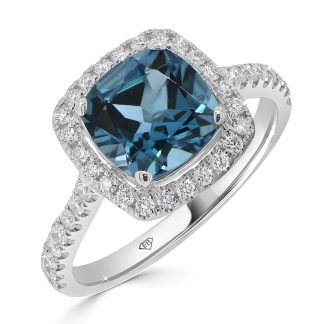 Cushion London blue topaz with round diamonds ring