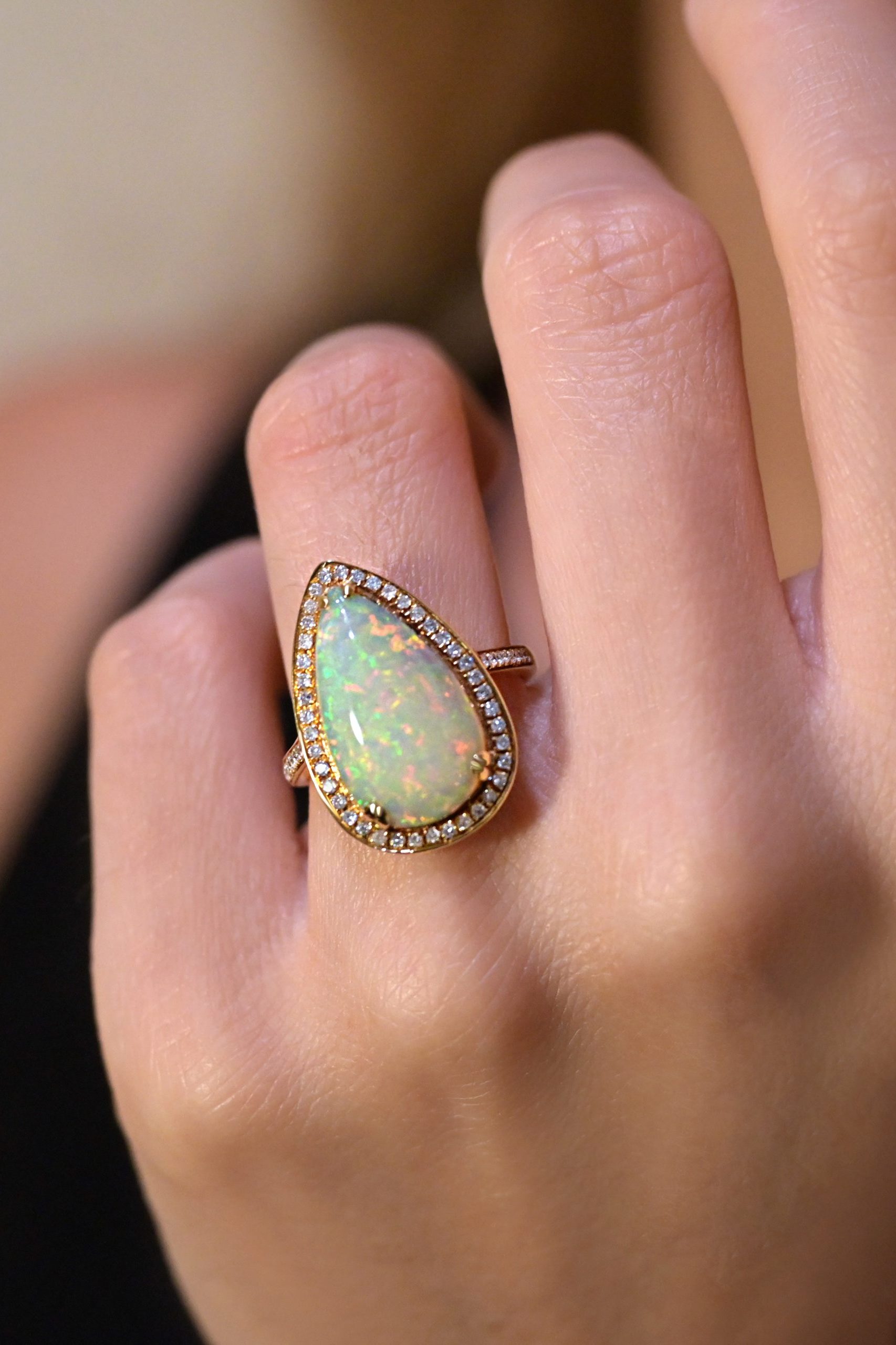 Opal Engagement Ring with diamond halo