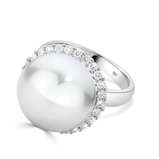 Pearl and Diamond Ring in 18kt White Gold Radiant ElegancePearl and diamond ring in 18kt white gold featuring a 13mm South Sea pearl with a diamond halo.