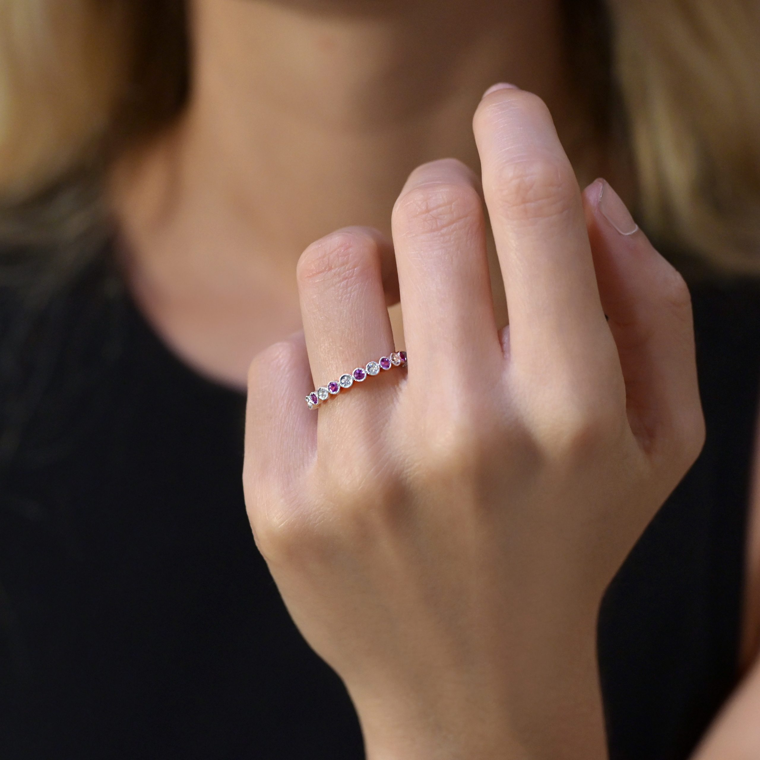 Diamond and pink sapphire wedding ring in 18ct white gold with vintage-inspired bezel settings.