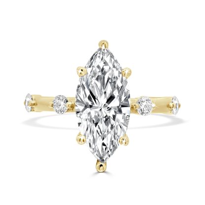 Engagement ring with marquise lab-grown diamond set in 18ct yellow gold with accent stones.